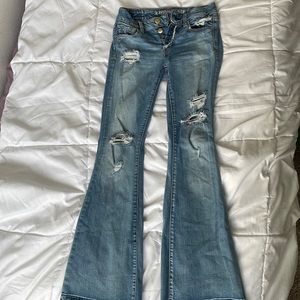 American Eagle Outfitters ripped jeans.